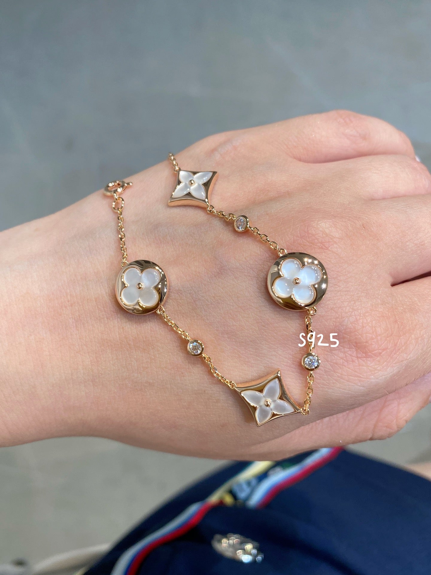 ¡®Moco¡¯STAR AND SUN 4 MOTIF WHITE MOP PINK GOLD BRACELET